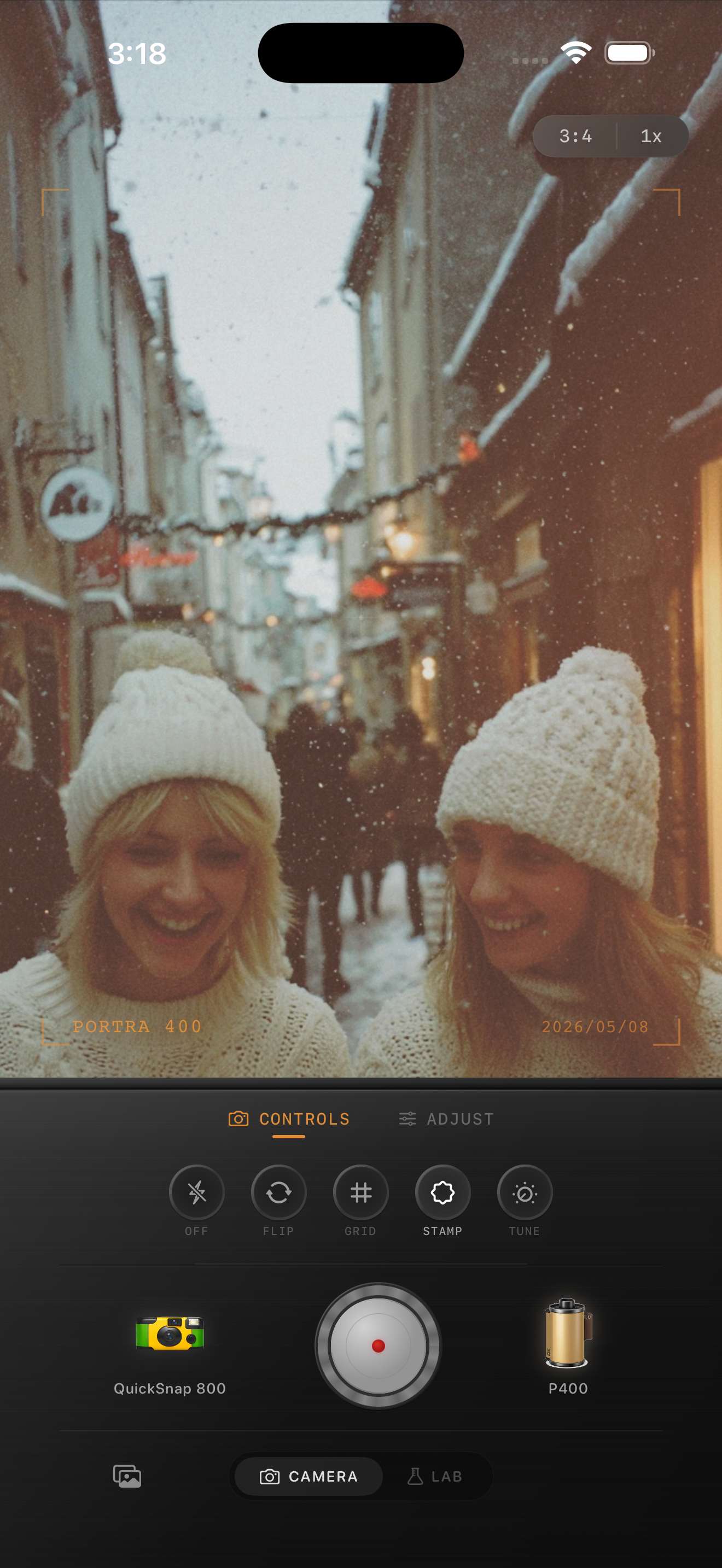 Nostalgia Cam example showing two friends in winter hats with a warm 35mm film look.