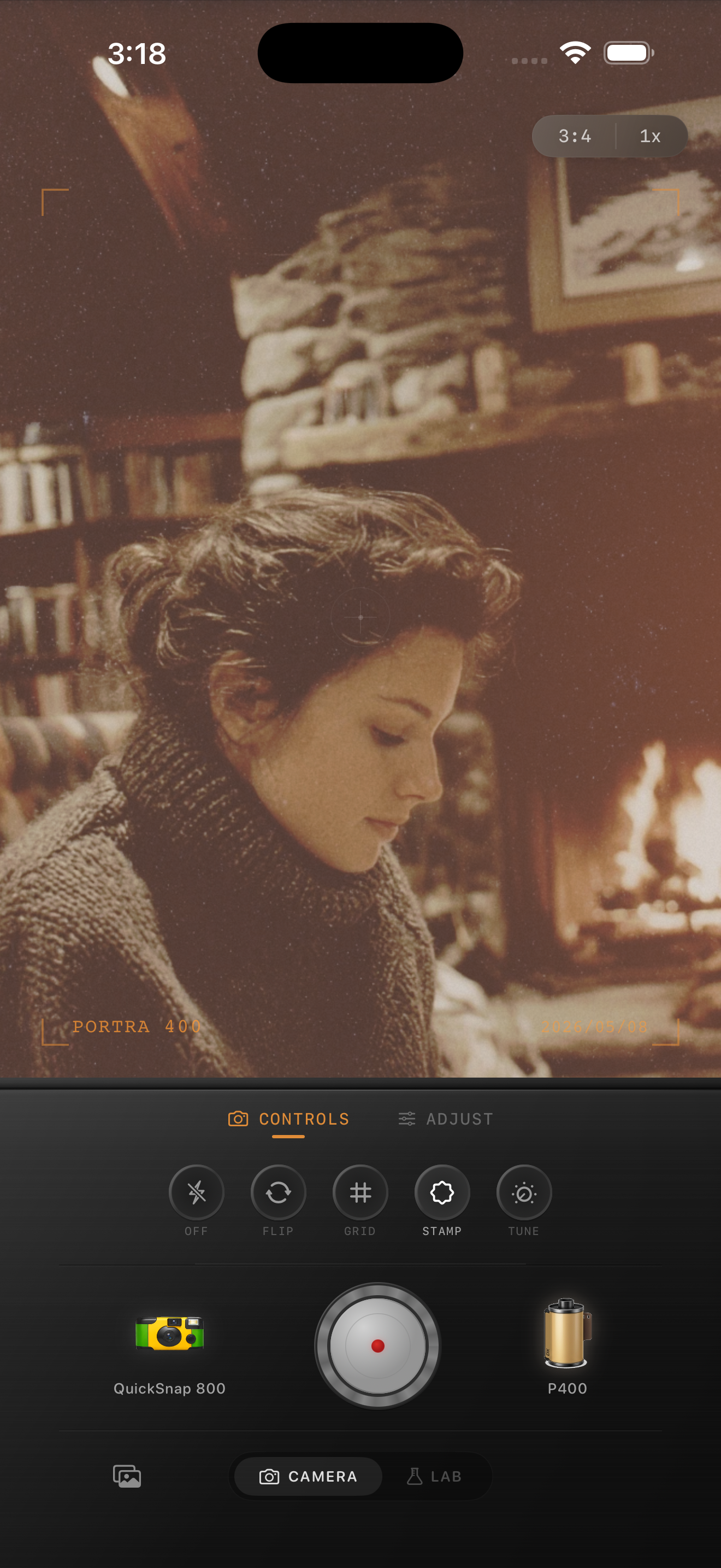Warm indoor portrait edited with Nostalgia Cam for a softer analog film look.